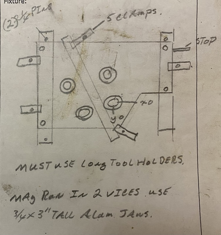 Magnesium part in 2 vises — long tool holders required — original